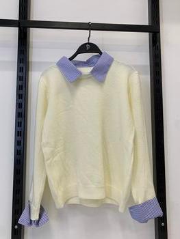 أبيض مائل للصفرة